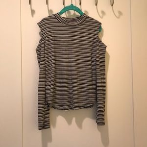 A black-and-white striped cold shoulder shirt